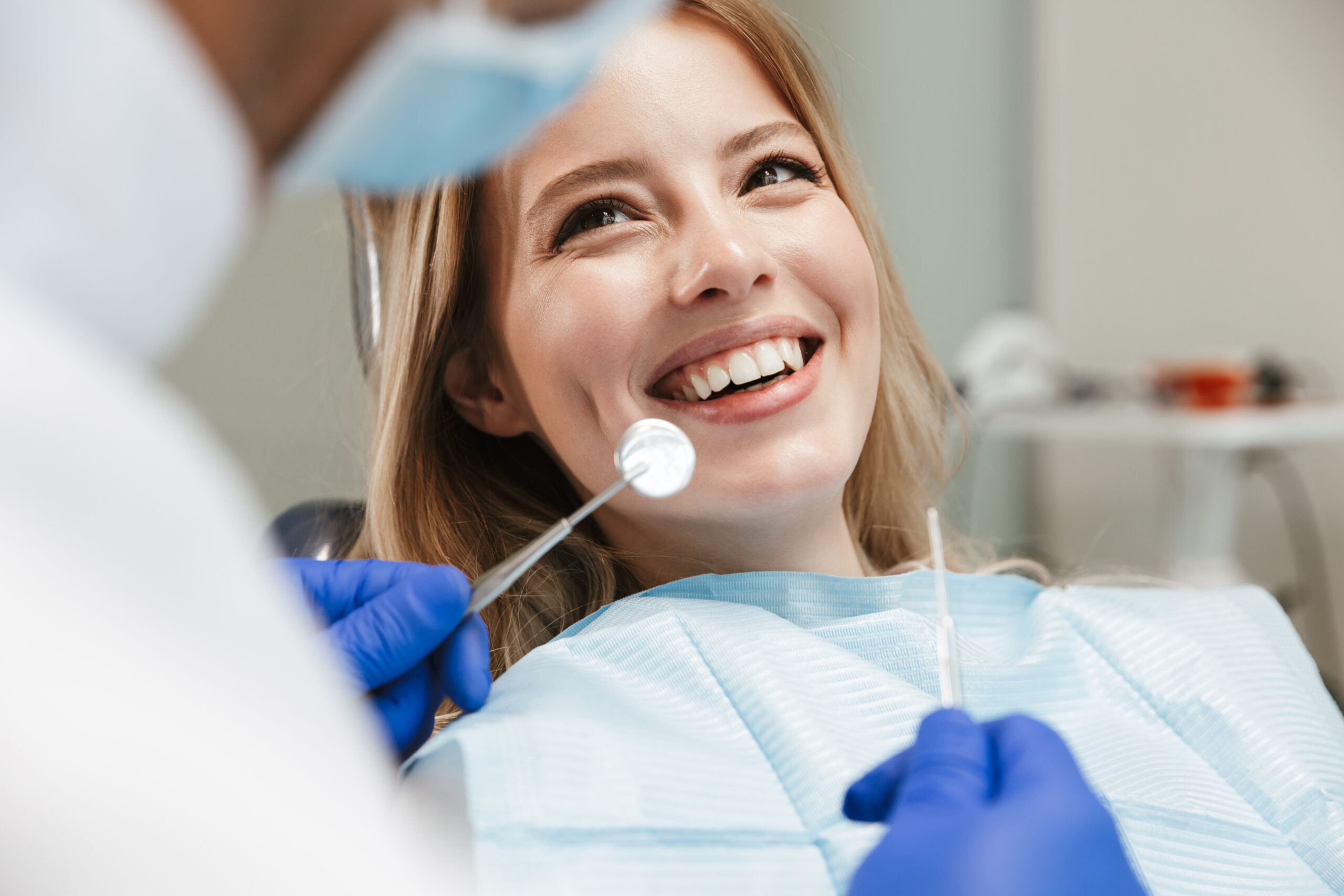 Woman with a bright, cosmetically enhanced smile